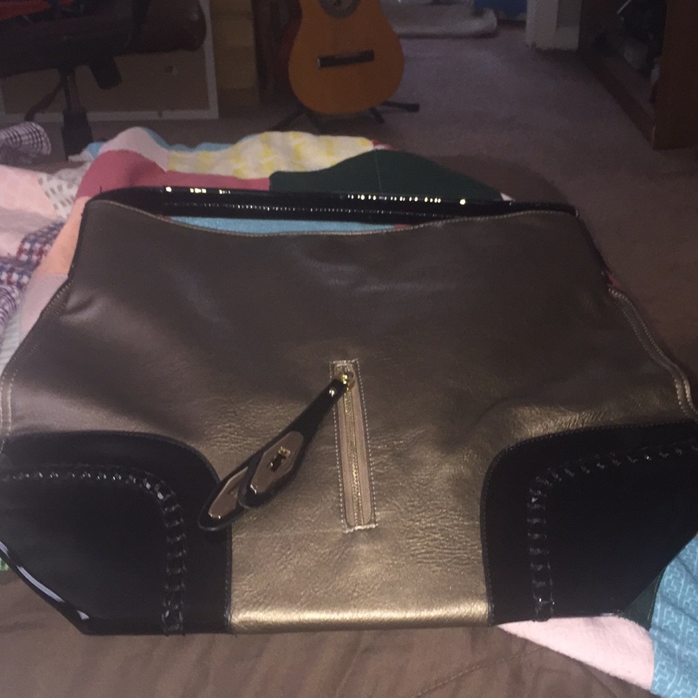 Brown and gold purse